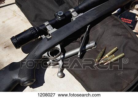 Detail of a rifle and bullets View Large Photo Image Stock Photo - Detail of a rifle and bullets. Fotosearch