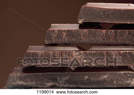 Detail of a stack of chocolate View Large Photo Image Picture - Detail of a stack of chocolate. Fotosearch