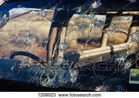 Detail of holes in a windshield View Large Photo Image Stock Image - Detail of holes in a windshield. Fotosearch