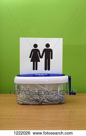 Gender symbols holding hands, about to be shredded View Large Photo Image Stock Photograph - Gender symbols holding hands, about to be shredded. Fotosearch