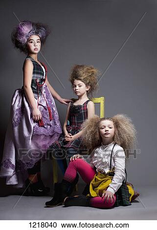 Stock Image - Girls dressed up in Marie Antoinette style. Fotosearch