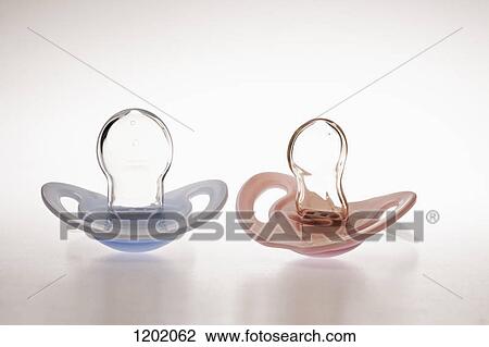 His and hers pacifiers View Large Photo Image Stock Image - His and hers pacifiers. Fotosearch