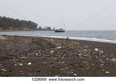 Stock Photo - Litter washed up on the beach of Krakatoa Island, Indonesia. Fotosearch
