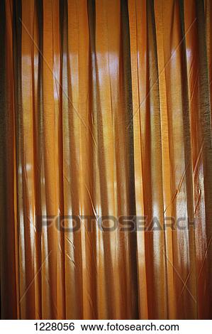 Stock Photograph - Looking through a curtain. Fotosearch