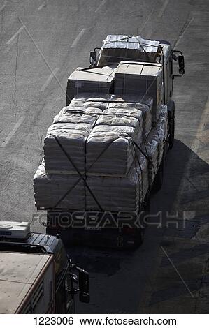 Lorry carrying goods, View Large Photo Image Stock Photograph - Lorry carrying goods, . Fotosearch