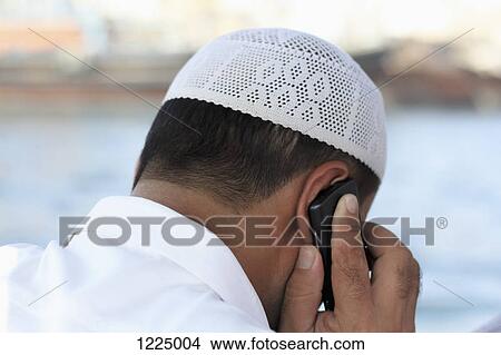 Picture - Man on phone. Fotosearch