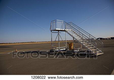 Mobile steps on an airport runway View Large Photo Image Stock Image - Mobile steps on an airport runway. Fotosearch