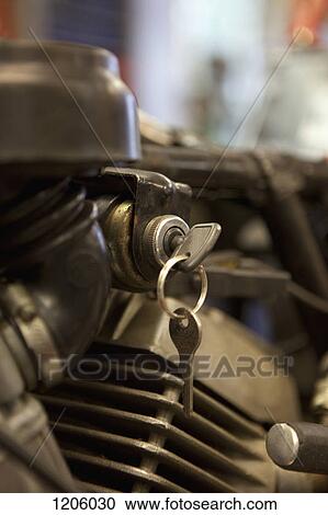 Motorcycle key in ignition View Large Photo Image Stock Image - Motorcycle key in ignition. Fotosearch