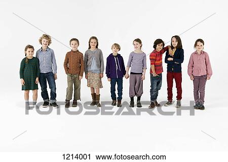 Nine kids standing in a row View Large Photo Image Stock Image - Nine kids standing in a row. Fotosearch