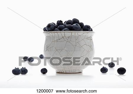 Overflowing bowl of blueberries View Large Photo Image Stock Photo - Overflowing bowl of blueberries. Fotosearch