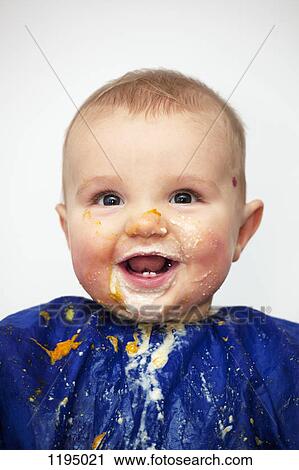 Portrait of a happy baby boy covered in food View Large Photo Image Stock Image - Portrait of a happy baby boy covered in food. Fotosearch