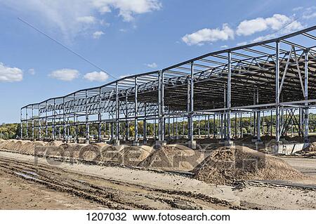 Sand mounds beside construction frame View Large Photo Image Stock Image - Sand mounds beside construction frame. Fotosearch