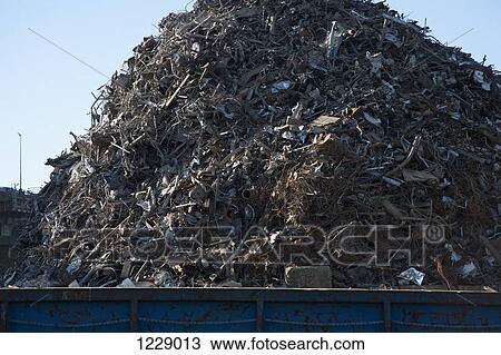 Scrap metal heap in container View Large Photo Image Stock Image - Scrap metal heap in container. Fotosearch