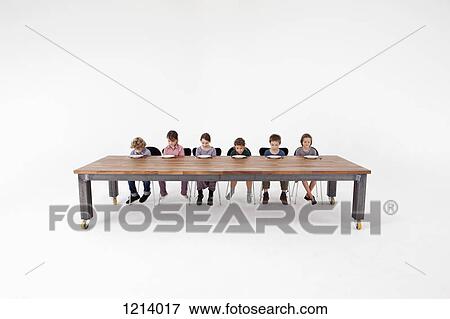 Six sad kids looking down longingly at their empty plates View Large Photo Image Stock Photo - Six sad kids looking down longingly at their empty plates. Fotosearch