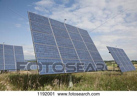 Stock Image - Solar panels in a field. Fotosearch