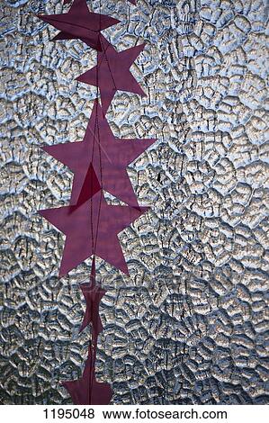 Star decorations against a silver patterned background View Large Photo Image Stock Photo - Star decorations against a silver patterned background. Fotosearch