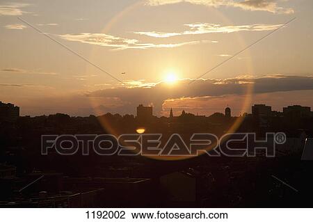Stock Image - Sun setting over Montreal, Canada. Fotosearch