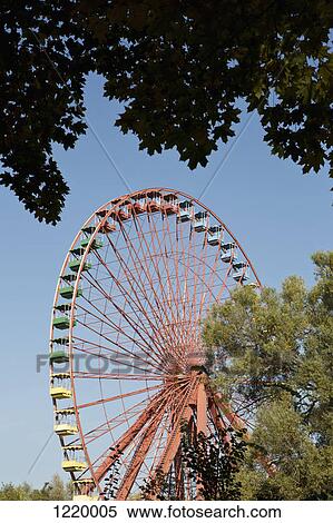 Sunlight shining on a stationary Ferris Wheel View Large Photo Image Stock Photography - Sunlight shining on a stationary Ferris Wheel. Fotosearch