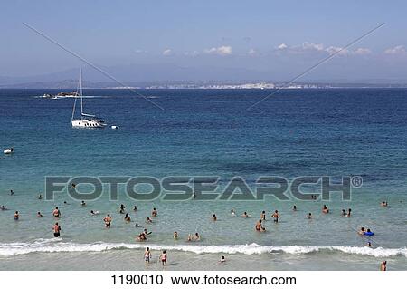 Swimmers in the sea, Palau, Olbia-Tempio, Italy View Large Photo Image Stock Image - Swimmers in the sea, Palau, Olbia-Tempio, Italy. Fotosearch