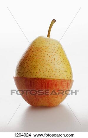 Two pieces of different fruit stacked to comprise the shape of a piece of fruit View Large Photo Image Picture - Two pieces of different fruit stacked to comprise the shape of a piece of fruit. Fotosearch