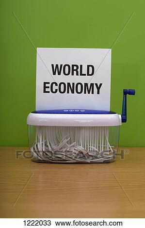 Words 'world economy' going through a shredding machine View Large Photo Image Stock Image - Words 'world economy' going through a shredding machine. Fotosearch