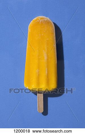 Yellow ice popsicle View Large Photo Image Stock Photo - Yellow ice popsicle. Fotosearch