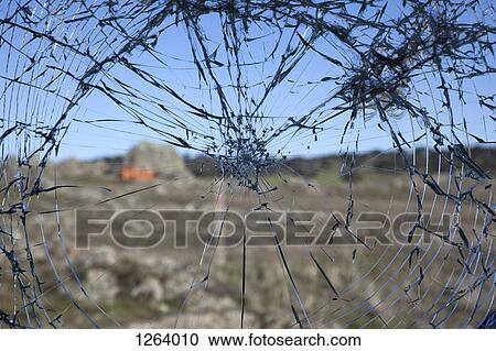 A blurred rural landscape seen through a shattered window View Large Photo Image Stock Image - A blurred rural landscape seen through a shattered window. Fotosearch