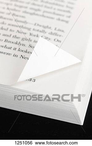 A book page with a corner folded down View Large Photo Image Stock Photograph - A book page with a corner folded down. Fotosearch