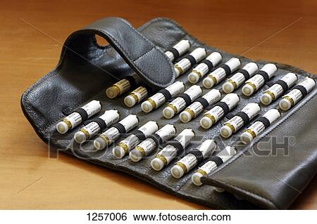 A case of small vials of homeopathic medicines View Large Photo Image Stock Photograph - A case of small vials of homeopathic medicines. Fotosearch