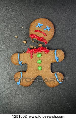 A decapitated gingerbread man View Large Photo Image Stock Image - A decapitated gingerbread man . Fotosearch