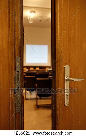 A door opening into a room View Large Photo Image Stock Photography - A door opening into a room. Fotosearch