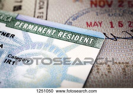 A Green Card lying on an open passport, close-up, full frame View Large Photo Image Stock Image - A Green Card lying on an open passport, close-up, full frame. Fotosearch