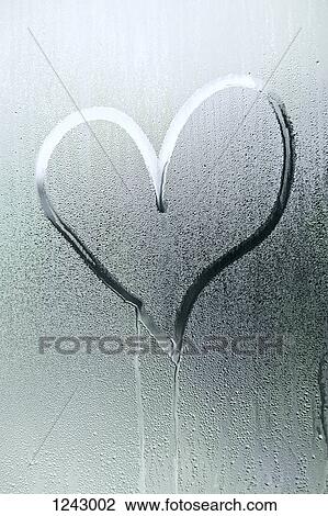 A heart shape drawn in the condensation of a window View Large Photo Image Stock Image - A heart shape drawn in the condensation of a window. Fotosearch