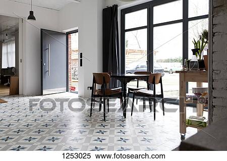 A hip tidy dining room with flooring that has a star shaped pattern View Large Photo Image Stock Photography - A hip tidy dining room with flooring that has a star shaped pattern. Fotosearch