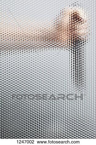 A human hand holding a knife behind a beveled glass window View Large Photo Image Stock Image - A human hand holding a knife behind a beveled glass window. Fotosearch