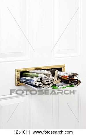 A mail slot stuffed with mail and newspapers, close-up View Large Photo Image Stock Image - A mail slot stuffed with mail and newspapers, close-up. Fotosearch
