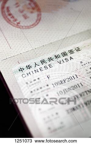 A passport with a Chinese visa in it, close-up View Large Photo Image Stock Image - A passport with a Chinese visa in it, close-up. Fotosearch