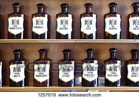 A range of natural spirits, acids and oils in homeopathic pharmacy View Large Photo Image Stock Photo - A range of natural spirits, acids and oils in homeopathic pharmacy. Fotosearch