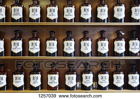 A range of natural spirits, acids and oils in homeopathic pharmacy View Large Photo Image Stock Photo - A range of natural spirits, acids and oils in homeopathic pharmacy. Fotosearch