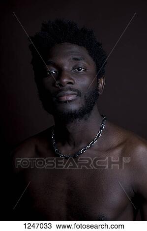 A shirtless man looking thoughtfully into the camera View Large Photo Image Stock Image - A shirtless man looking thoughtfully into the camera. Fotosearch