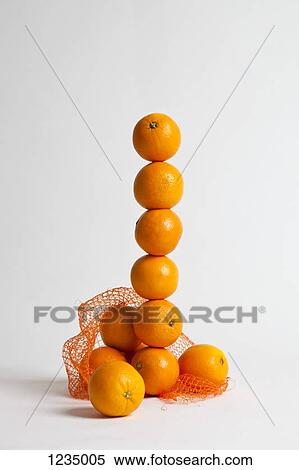 A stack of oranges View Large Photo Image Stock Photography - A stack of oranges. Fotosearch