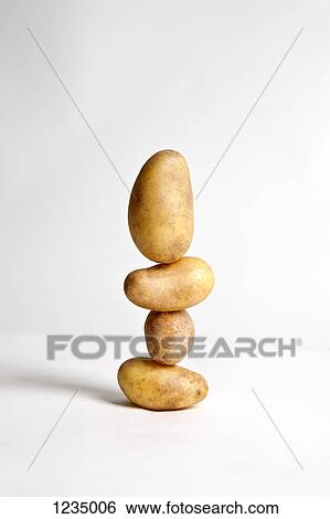 A stack of potatoes View Large Photo Image Stock Photograph - A stack of potatoes. Fotosearch