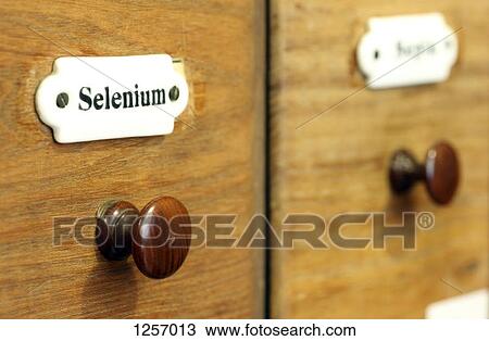 A wooden drawer in pharmacy containing the chemical element Selenium View Large Photo Image Stock Image - A wooden drawer in pharmacy containing the chemical element Selenium. Fotosearch