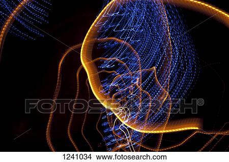 Abstract patterns of blue and orange light trails View Large Photo Image Picture - Abstract patterns of blue and orange light trails. Fotosearch