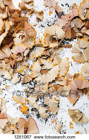 An abundance of pencil shavings and lead on a white background View Large Photo Image Stock Photo - An abundance of pencil shavings and lead on a white background. Fotosearch