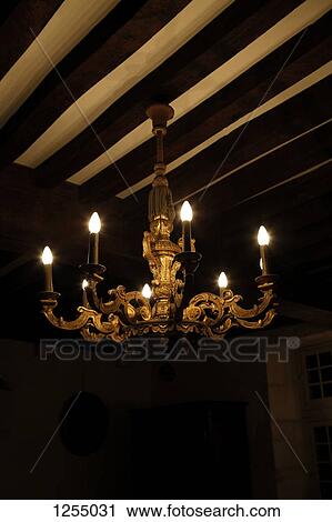 An illuminated chandelier View Large Photo Image Stock Image - An illuminated chandelier. Fotosearch
