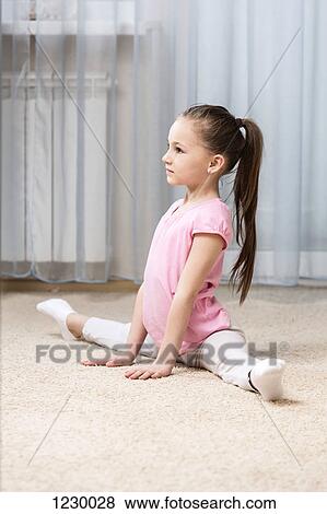 Ballerina girl doing the splits in her bedroom View Large Photo Image Stock Photo - Ballerina girl doing the splits in her bedroom. Fotosearch