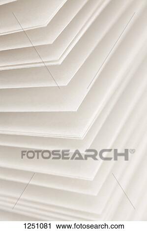 Stock Image - Blank pages of a diary fanned out, full frame close-up. Fotosearch