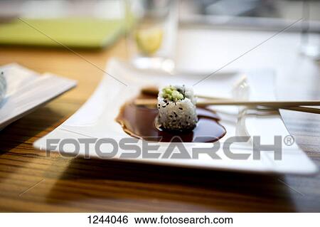 California roll sushi in soy sauce View Large Photo Image Stock Photograph - California roll sushi in soy sauce. Fotosearch