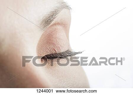 Close up of woman's closed eye View Large Photo Image Stock Image - Close up of woman's closed eye. Fotosearch